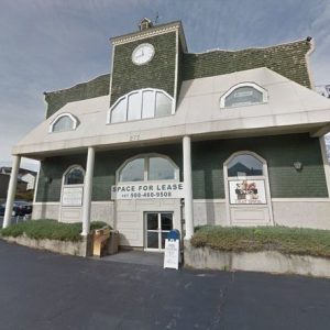 A three-story green commerical building