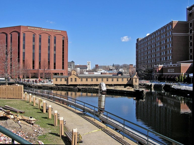 Brick buildings along a canal