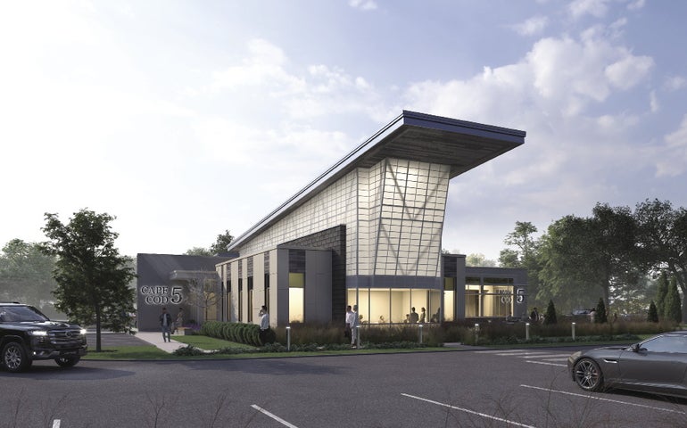 Contemporary bank branch with cantilevered roof