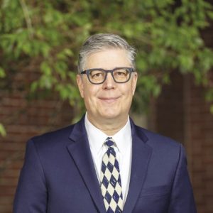 Man in suit with glasses