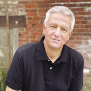 Man in black polo