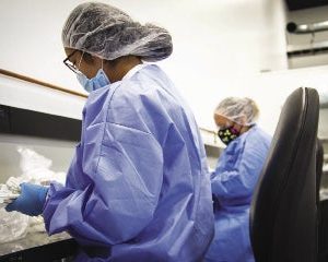 A photo of two BMP Medical technicians wearing scrub uniforms.