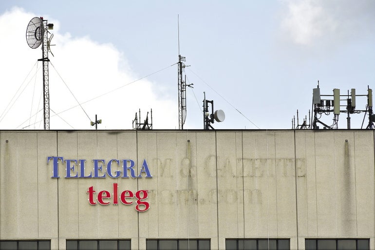A photo of the Telegram & Gazette sign, where half of the letters are removed