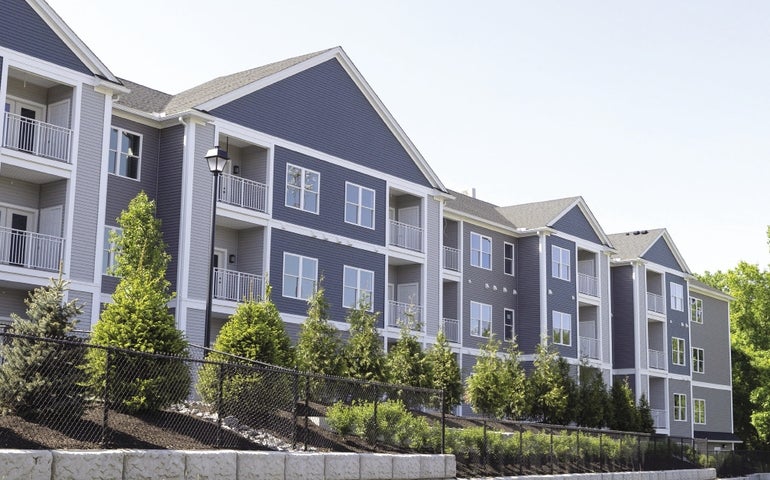 Bluish-gray apartment building