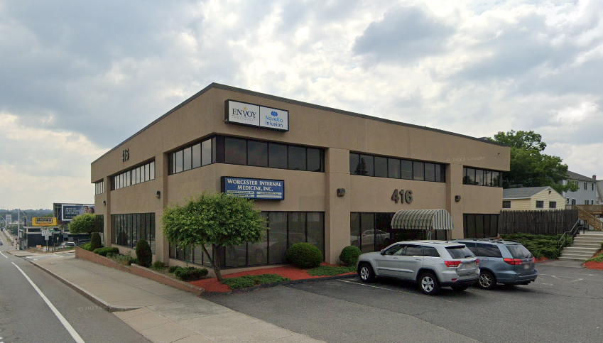 A stucco two-story office building