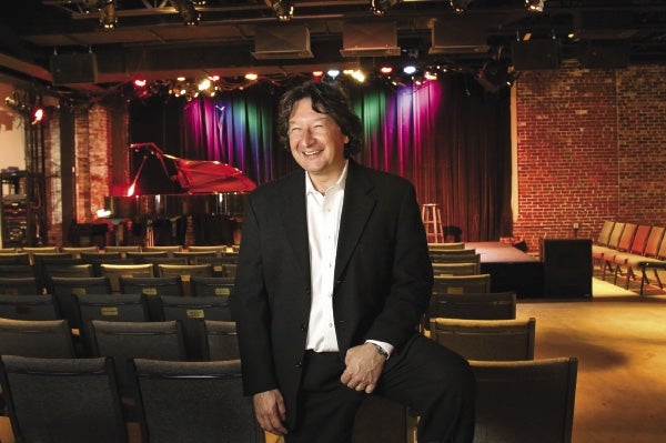 David Lavalley sits in the Center for the Arts in Natick's auditorium.