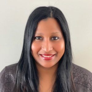 Woman with black hair in black shirt