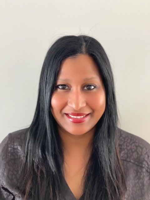 Woman with black hair in black shirt