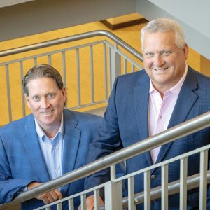 two men in a stairwell