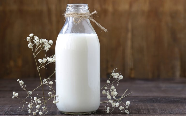 a glass bottle of mile