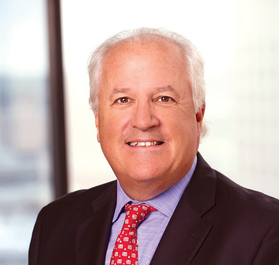 Man in suit with red tie