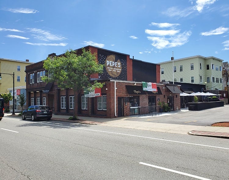 Photograph of brick building home of Pepe's Italian Restaurant