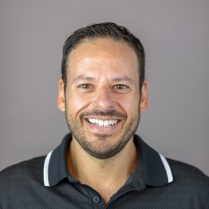 Man in black polo
