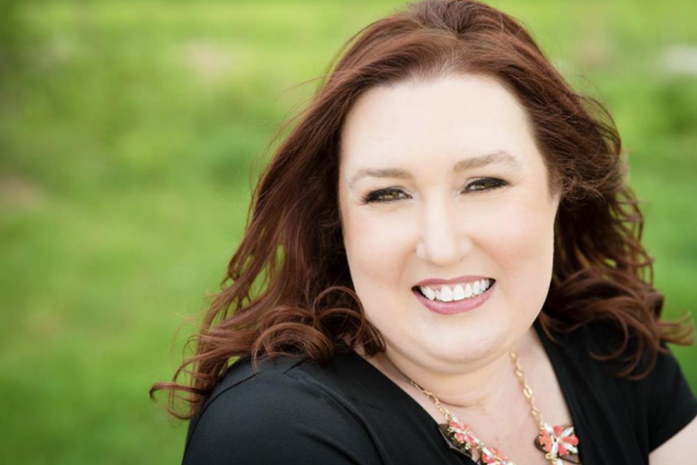 Susan Petroni smiling.