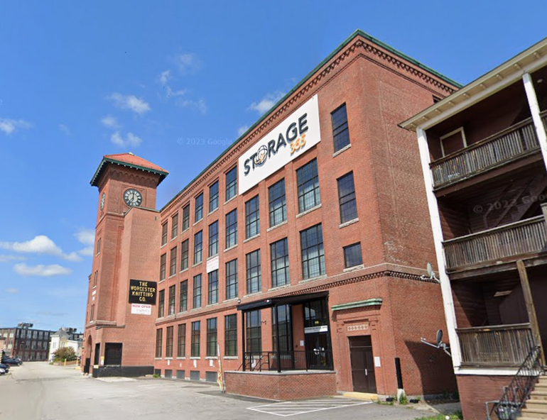 A large brick mill building