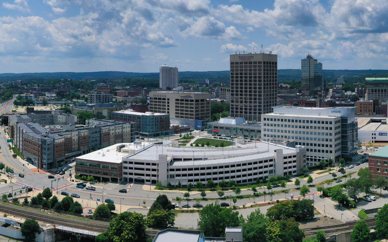 A picture of Worcester's skyline on a sunny day, with some clouds in the sky.