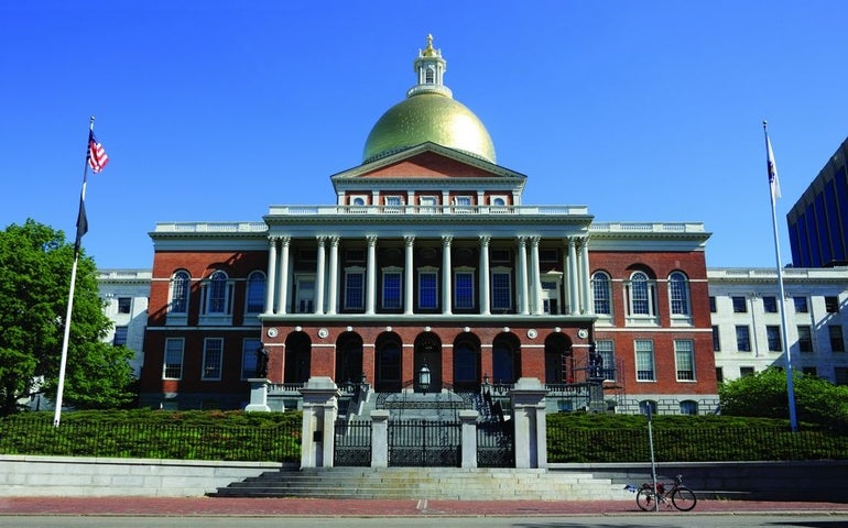 A look at the Massachusetts State House on a sunny day, it's golden dome gleaming in the sunlight.
