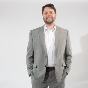 A man in a grey suit