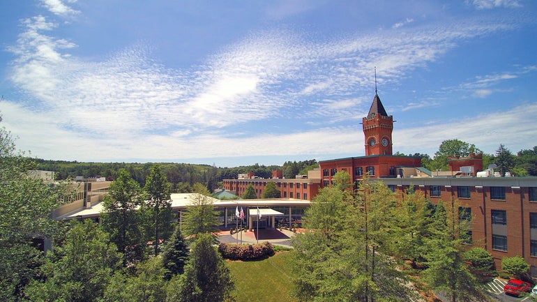 An aerial photo of a large industrial building/hotel