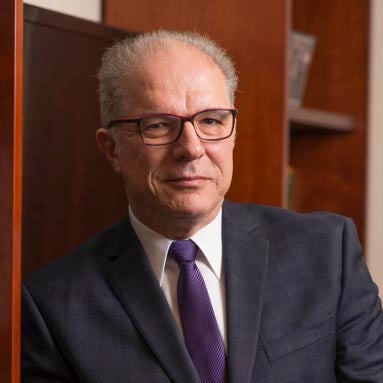 Man in suit with glasses