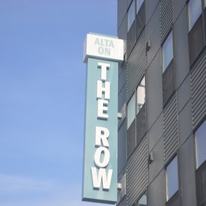 A sign for Alta on the Row