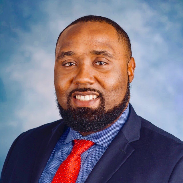 Man in suit in profile picture
