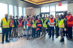 Group of high school students in construction gear