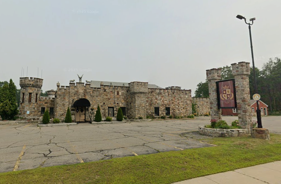 A one-story stone building resembling a castle