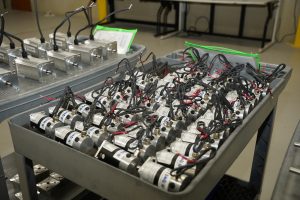 A table full of DC electric motors